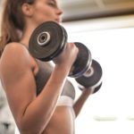 woman-in-gray-sports-bra-holding-black-dumbbell-3757376